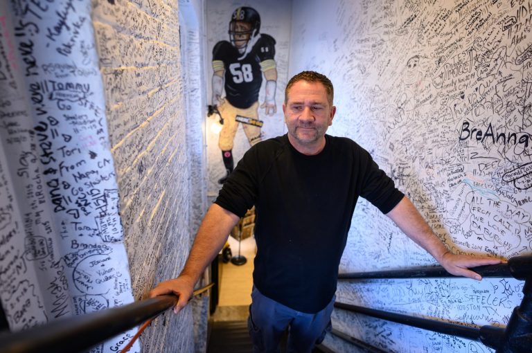 Jimmy Coen, owner of Yinzers in the Burgh, stands inside of his store on November 9 in Pittsburghâs Strip District.