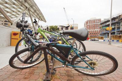 Metro has been rounding up and destroying abandoned bikes at its public racks.-Examiner File