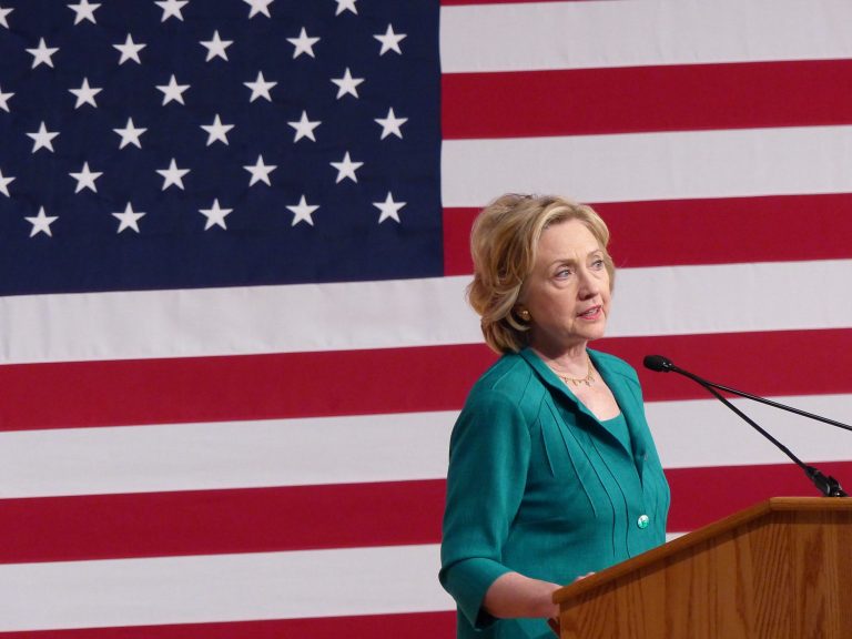 Democratic presidential candidate, former Secretary of State Hillary Rodham Clinton calls on Congress to end the trade embargo the U.S. has imposed against Cuba since 1962, Friday, July 31, 2015, during a campaign stop at Florida International University in Miami. (AP Photo/Gaston De Cardenas)