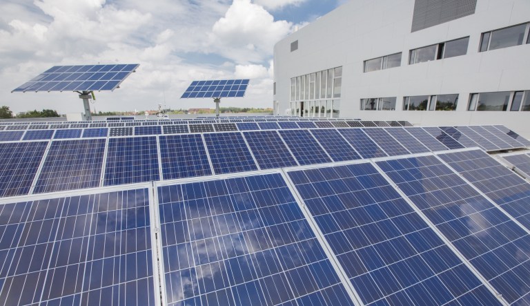 Photovoltaic modules sit on a factory rooftop in Germany, where many of the company's primary investors are from. (Martin Leissl/Bloomberg)