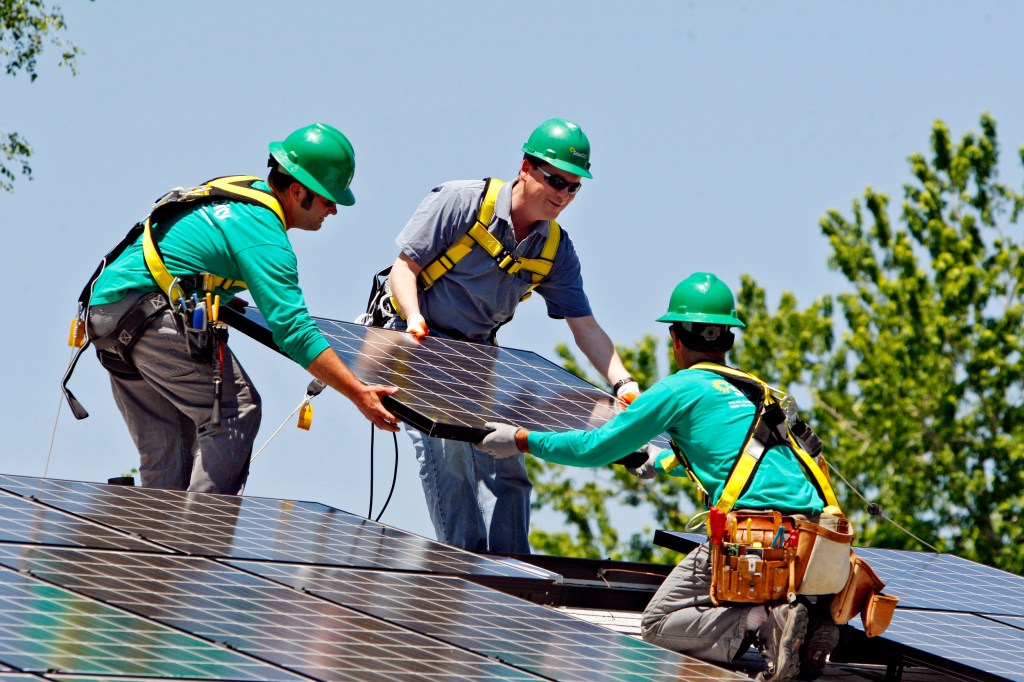 Elon Musk takes on carbon with solar, battery bets