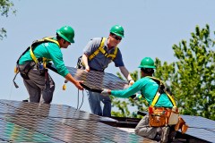 Elon Musk takes on carbon with solar, battery bets