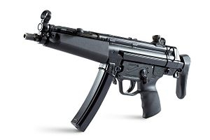 Friends accused of firing stolen FBI machine gun