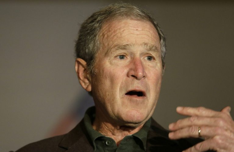Former President George W Bush speaks during a preview of an exhibition of his paintings of U.S. military veterans in Dallas, Tuesday, Feb. 28, 2017. President Bush says he didn't intend to criticize President Donald Trump when he said recently that a free press is essential to democracy. (AP Photo/LM Otero)