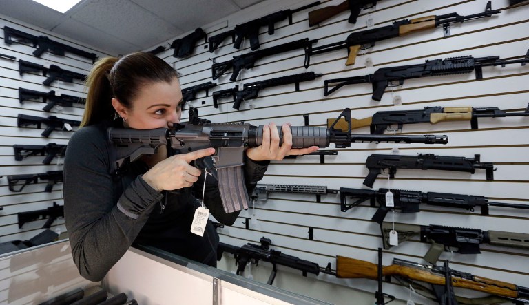 Advocates from both sides are arguing about language, which can worsen the discourse of the gun debate. (AP Photo/Elaine Thompson)