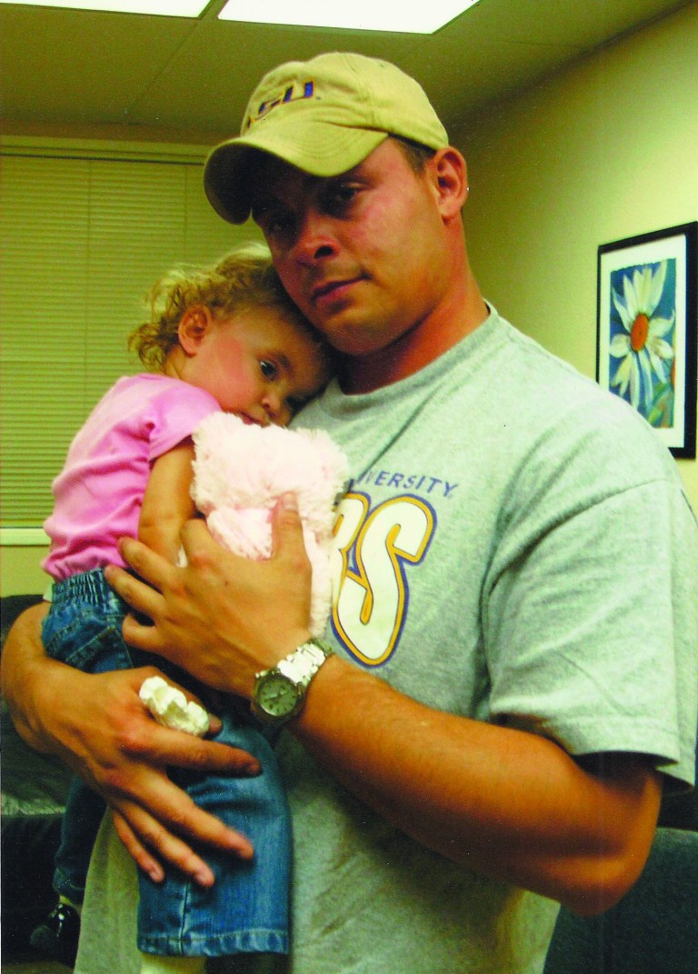 This undated photo provided by U.S. Navy Petty Officer 2nd Class John Moreno shows Moreno and his daughter, Vanessa. Moreno, who lives in New Orleans, has been fighting a custody battle for years over his daughter, who lives in Arizona with her mother. A national legal group that is meeting in Nashville this week wants to simplify custody and visitation laws for military service members, whose frequent deployments can leave them without legal recourse when family disputes erupt. (AP Photo/Courtesy John Moreno)