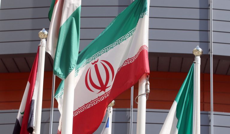 Iranian flags fly in front of a U.N. building, where closed-door nuclear talks with Iran take place in Vienna, Austria, Wednesday, July 2, 2014.