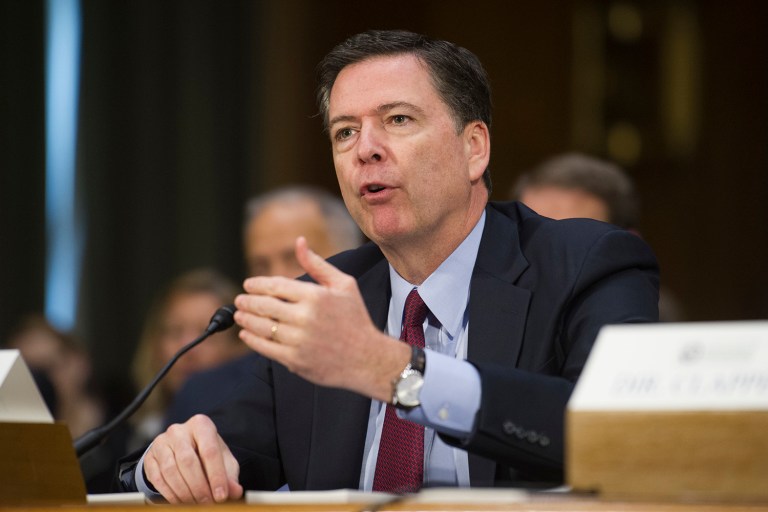 FBI Director James Comey testifies on Capitol Hill in Washington, Tuesday, Jan. 10, 2017, before the Senate Intelligence Committee hearing on Russian intelligence activities. (AP Photo/Cliff Owen)