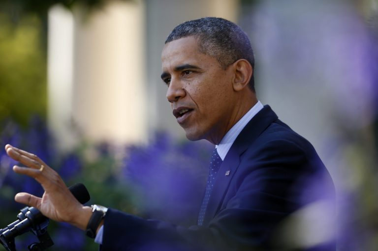 President Barack Obama gestures while speaking in the Rose Garden of the White House in Washington, Monday, Oct. 21, 2013, on the initial rollout of the health care overhaul. Obama acknowledged that the widespread problems with his health care law's rollout are unacceptable, as the administration scrambles to fix the cascade of computer issues. (AP Photo/Charles Dharapak)