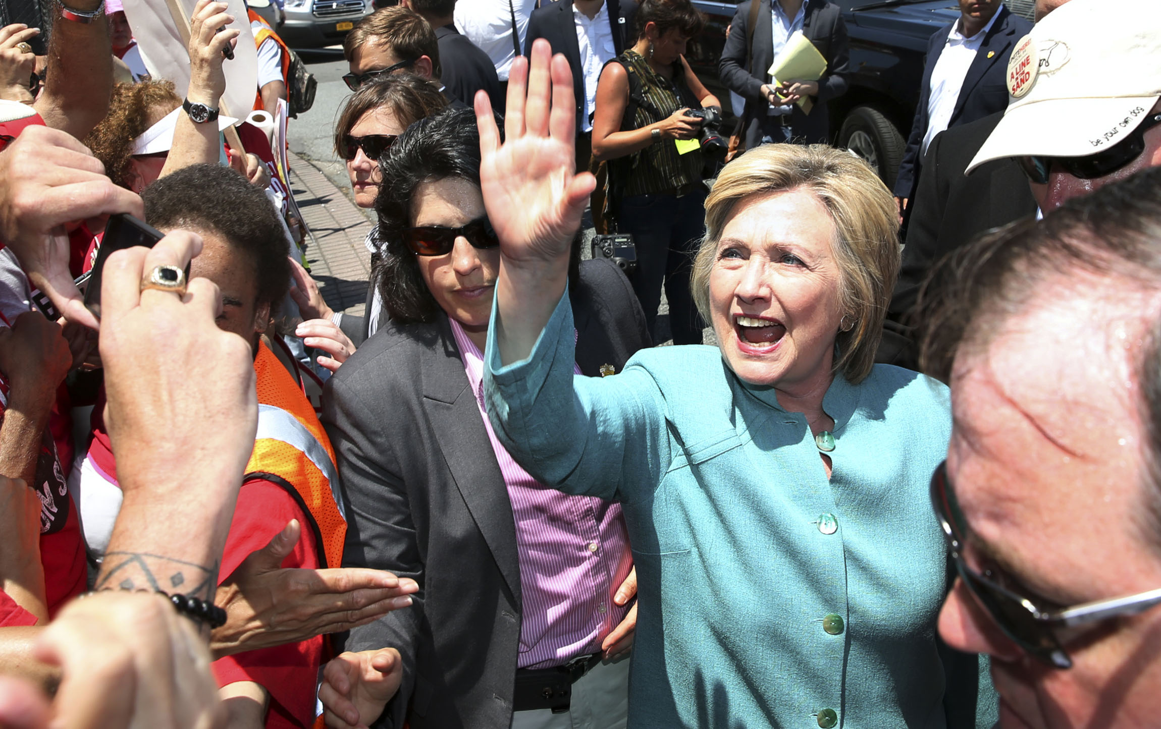 Hillary Clinton cheers on anti-Trump climate march