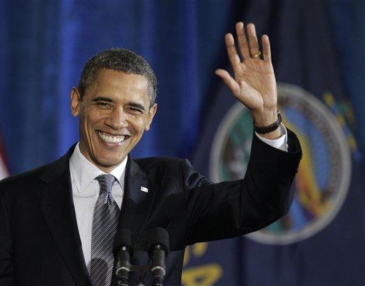 President Obama waves to the crowd at Osawatomie High School in Osawatomie, Kansas, Tuesday, Dec. 6, 2011, prior to delivering a major speech on the economy.