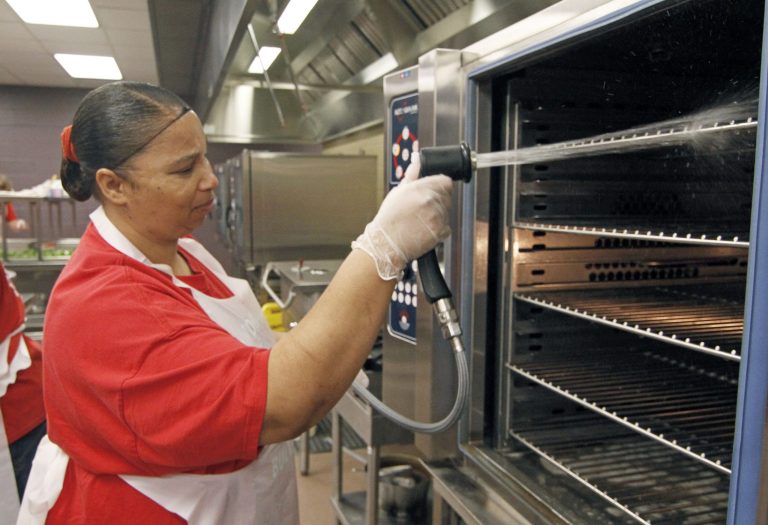 Companies denied workers the minimum hourly rate required by the government as well as overtime pay. (AP Photo/Rogelio V. Solis)