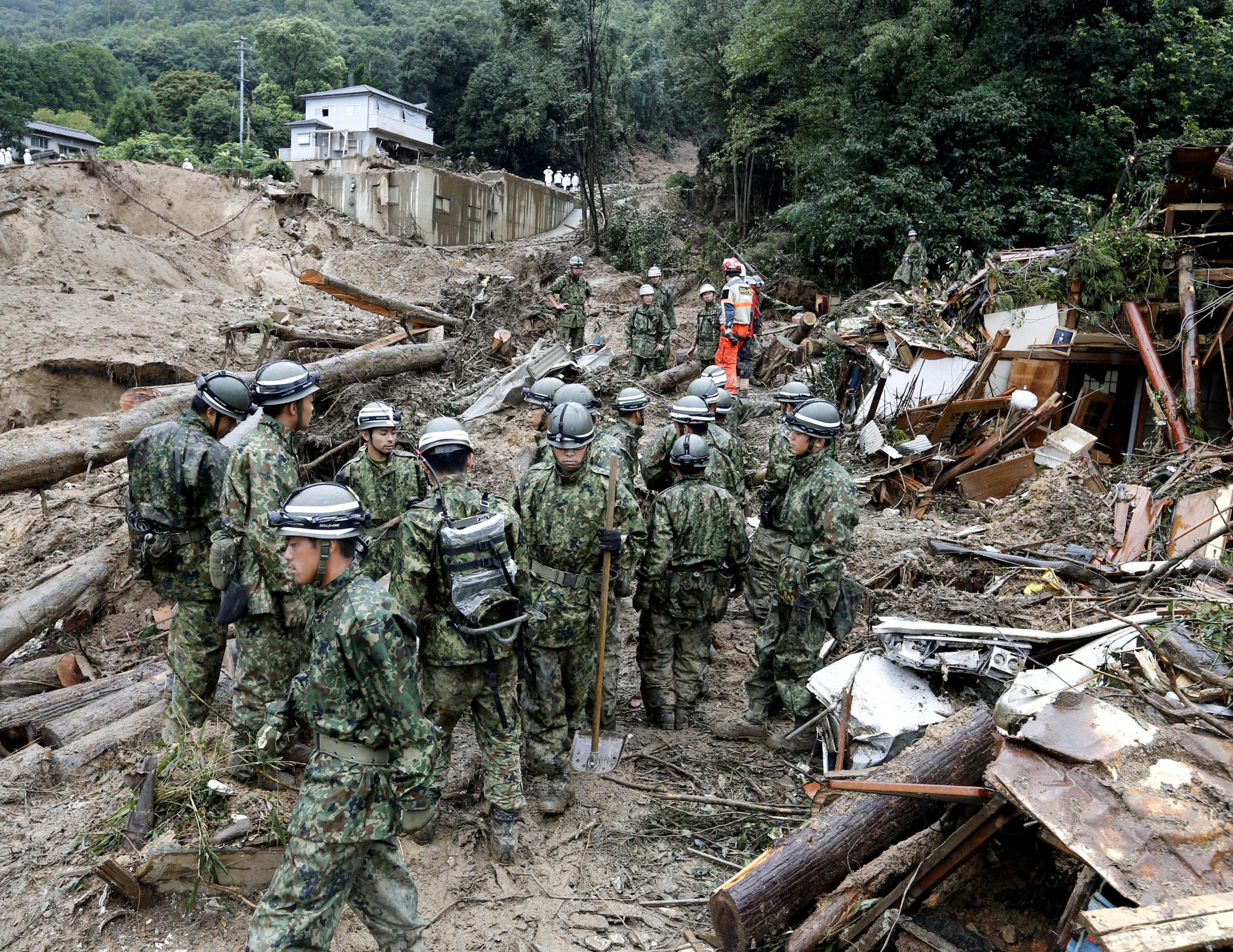 Rains raise search risk after Japan landslides