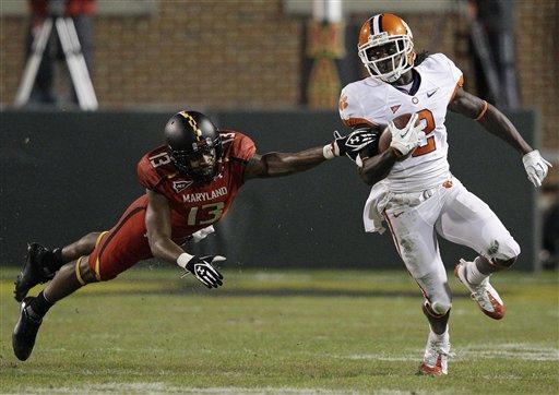 Clemson wide receiver Sammy Watkins, right, attempts to outrun Maryland defender Kerry Boykins in the first half of an NCAA college football game in College Park, Md., Saturday, Oct. 15, 2011. Clemson won 56-45. (AP Photo/Patrick Semansky)