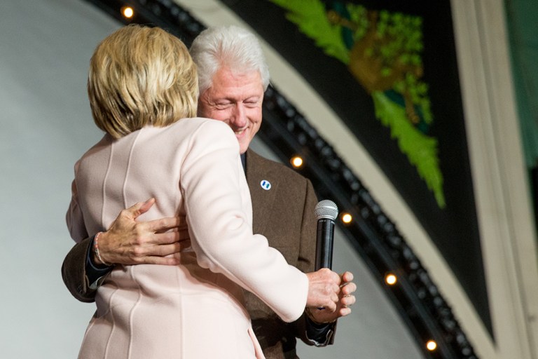 Bill Clinton welcomed his wife on stage with something you don't see often from the Clintons: a hug and a kiss. 