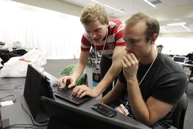 The pilot is modeled after initiatives undertaken by private companies to increase security. (AP Photo/Ted S. Warren)