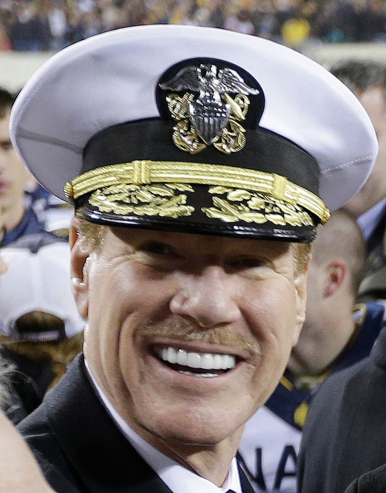   FILE -In this Saturday, Dec. 8, 2012 file photo, Superintendent of the United States Naval Academy, Vice Admiral Michael H. Miller, poses for photographs with the Commander-in-Chief Trophy after Navy beat Army 17-13 in an NCAA college football game, in Philadelphia. A midshipman accusing three former Naval Academy football players of sexually assaulting her wants the Vice Admiral Michael H. Miller to remove himself from deciding whether the men will be court-martialed. (AP Photo/Matt Rourke, File)  