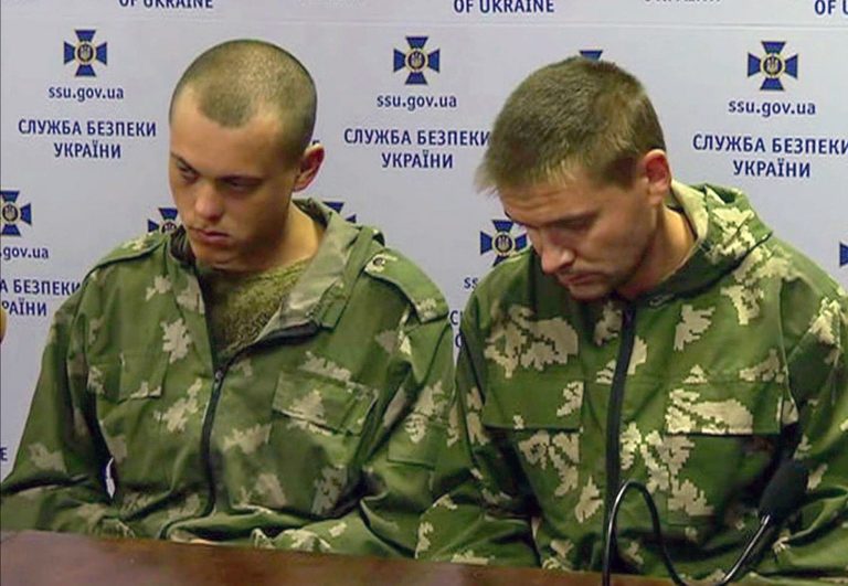 Captured Russian paratroopers are seen in this image taken from video in Kiev on Wednesday Aug. 27. 2014. Ten Russian paratroopers were captured this week in Ukraine, adding to a growing body of evidence that Russia, despite its denials, is sending regular troops and weapons to support the separatists in their increasingly deadly fight against Ukrainian forces. (AP Photo/Channel 5) UKRAINE OUT TV OUT