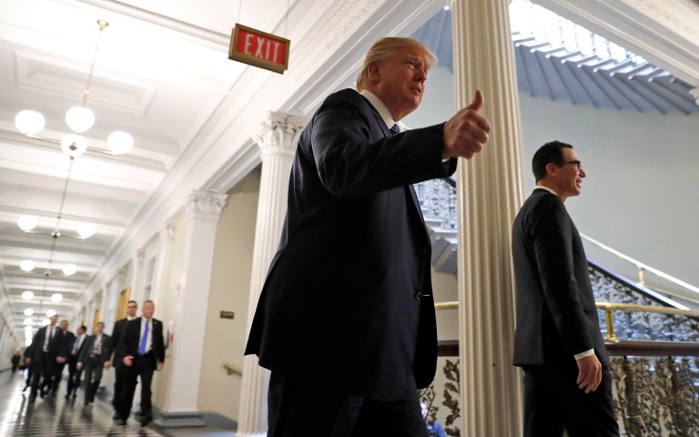 A White House turf war over tax reform has contributed to the confusion and uncertainty about the president's position. (AP Photo/Alex Brandon)