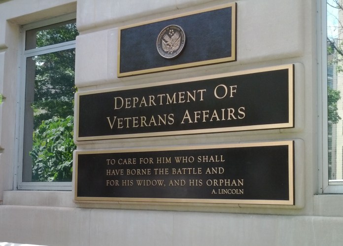A sign of the Department of Veterans Affairs is shown above.
