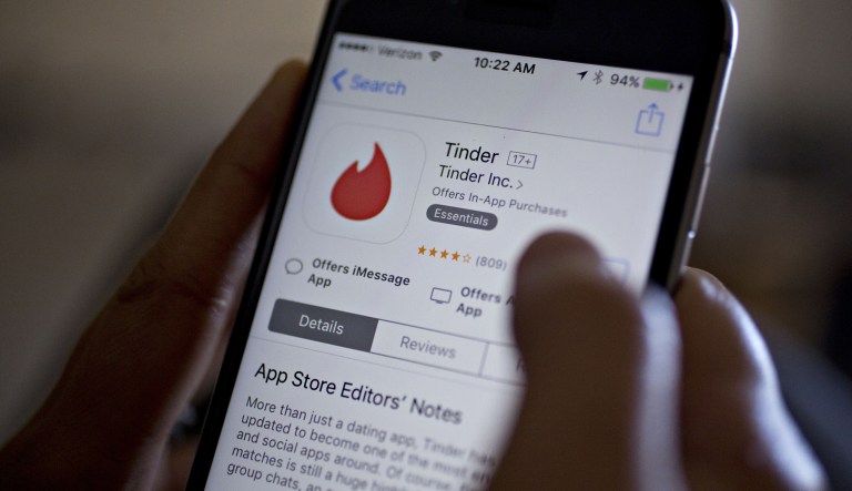 The Tinder application is displayed in the Apple App Store on an iPhone in Washington, D.C., on Saturday, Feb. 4, 2017.