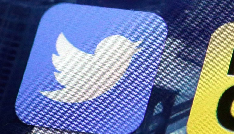 FILE - This Friday, Oct. 18, 2013, file photo, shows a Twitter app on an iPhone screen, in New York. (AP Photo/Richard Drew, File)