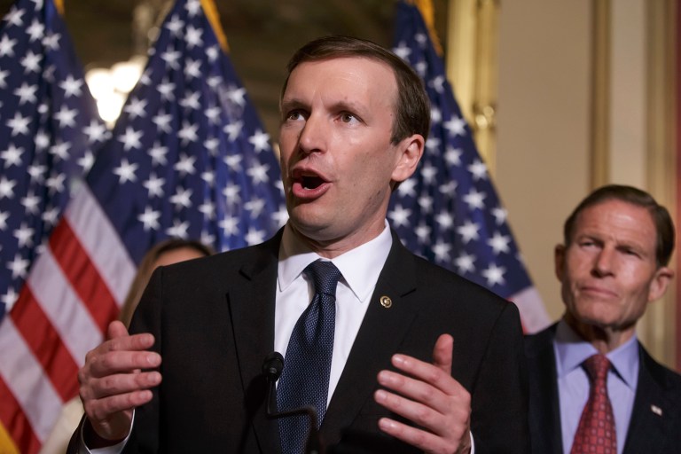 Sen. Chris Murphy, D-Conn., left, who mourned the loss of 20 children in his home state, waged a roughly 15-hour filibuster into early Thursday, asserting as he yielded the floor that Republican leaders had committed to hold votes on expanded gun background checks and a ban on gun sales to suspected terrorists. (AP Photo/J. Scott Applewhite)