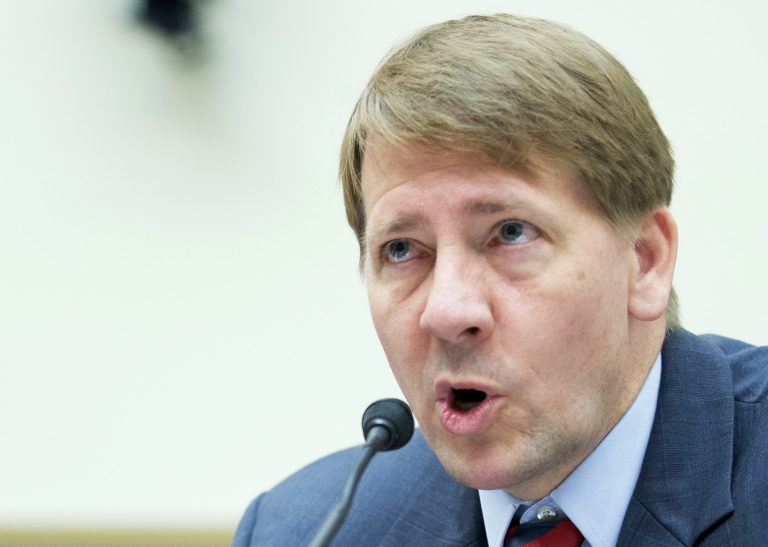 Consumer Financial Protection Bureau Director Richard Cordray testifies on Capitol Hill in Washington, Thursday before the House Financial Services Committee. (AP Photo/Manuel Balce Ceneta)