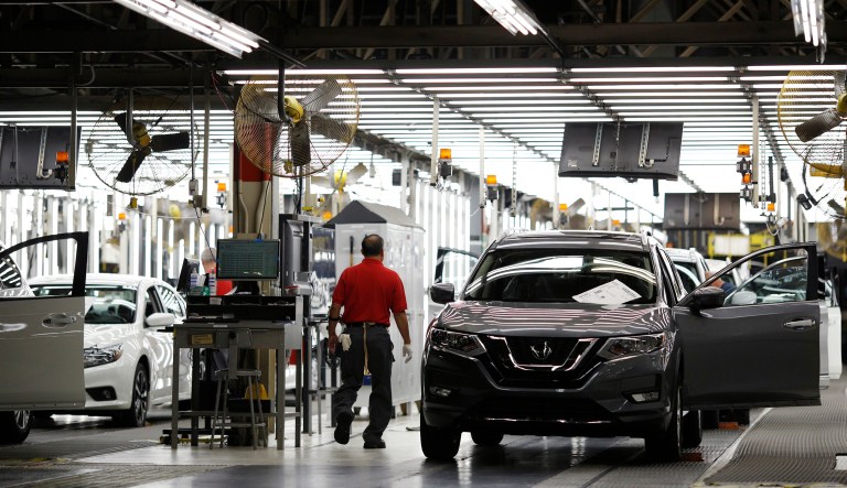 A worker performs final inspections on a vehicle at the Nissan Motor Co. manufacturing facility in Smyrna, Tennessee, U.S., on Tuesday, Oct. 31, 2017. Nissan Motor Co. is scheduled to release earnings figures on November 7.