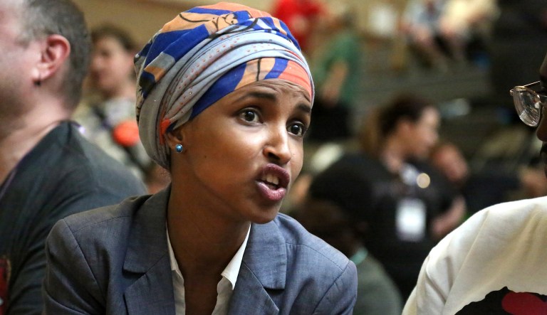 Minnesota Rep. Ilhan Omar pauses while speaking during the Democratic Farmer Labor Party endorsement convention in Minneapolis, Minn., on Sunday, June 17, 2018.