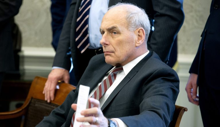John Kelly, White House chief of staff, sits during a meeting with U.S. President Donald Trump, at the Oval Office of the White House in Washington, D.C., U.S., on Tuesday, Dec. 11, 2018. 