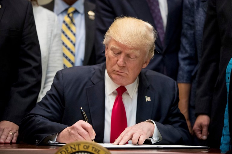 Now all he has to do is sign the order. (AP Photo/Andrew Harnik)