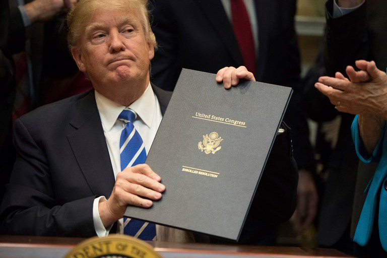 The rules were on education, federal land use and fair pay. (AP Photo/Andrew Harnik)