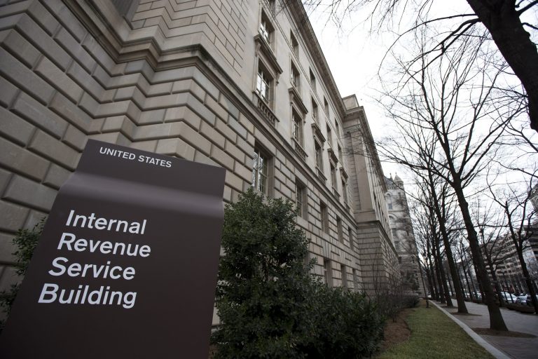 A recent report by the IRS inspector general says the agency has given out somewhere between $110 billion and $132 billion in improper Earned Income Tax Credit payments in the last decade. In that time period, between 21and 30 percent of tax credit payments went to people who didn't qualify for them. (AP/Manuel Balce Ceneta)