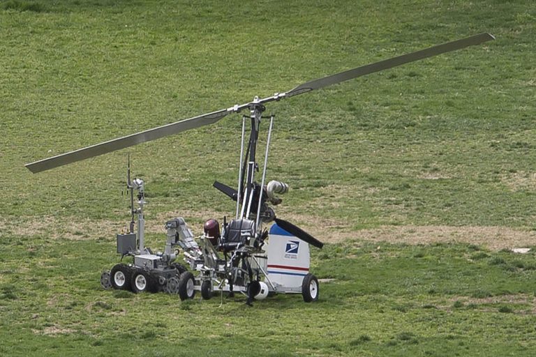 A bomb disposal robot is used to inspect a small gyro helicopter on the West Lawn of the Capitol in Washington, Wednesday, April 15, 2015. (Graeme Jennings/Washington Examiner)