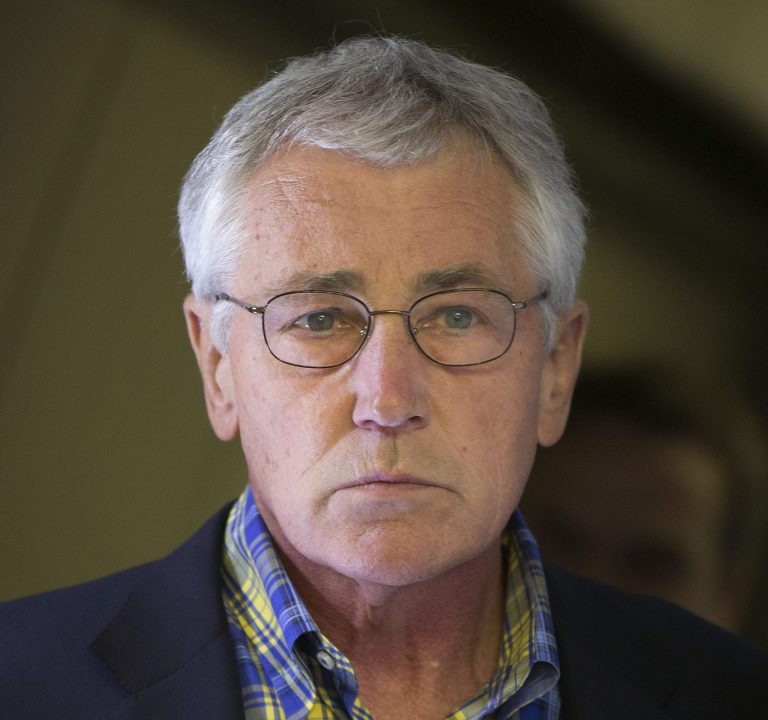 U.S. Defense Secretary Chuck Hagel is seen aboard a U.S. Military Aircraft before speaking to members of the media during his flight, Sunday, June 1, 2014. Hagel spoke about the released of U.S. Army Sgt. Bowe Bergdahl who was held hostage in Afghanistan, and who was handed over Saturday morning by members of the Taliban in exchange for five Afghan detainees held at the military prison in Guantanamo Bay prison in Cuba. (AP Photo/Pablo Martinez Monsivais, Pool)