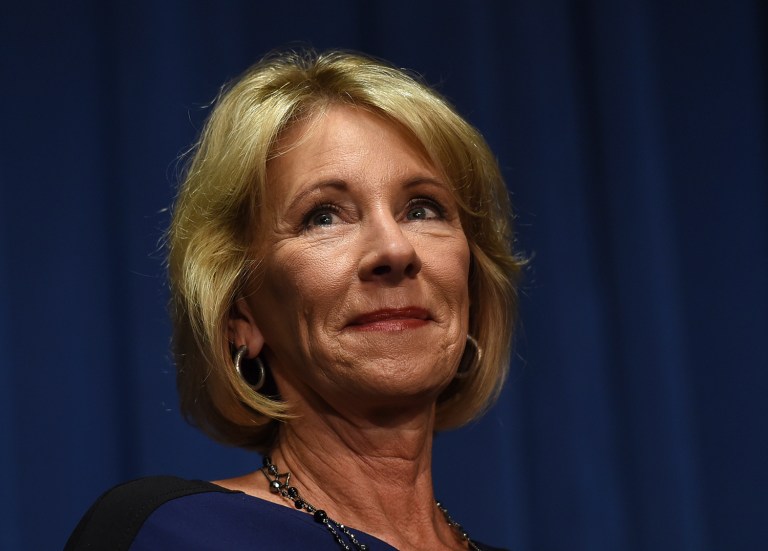 Protesters blocked Education Secretary Betsy DeVos from entering a DC public school. (AP Photo/Molly Riley)