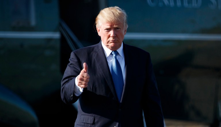 President Trump said Monday that NFL must take steps to ensure that players stand, instead of taking a knee, when the national anthem is played. (AP Photo/Evan Vucci)