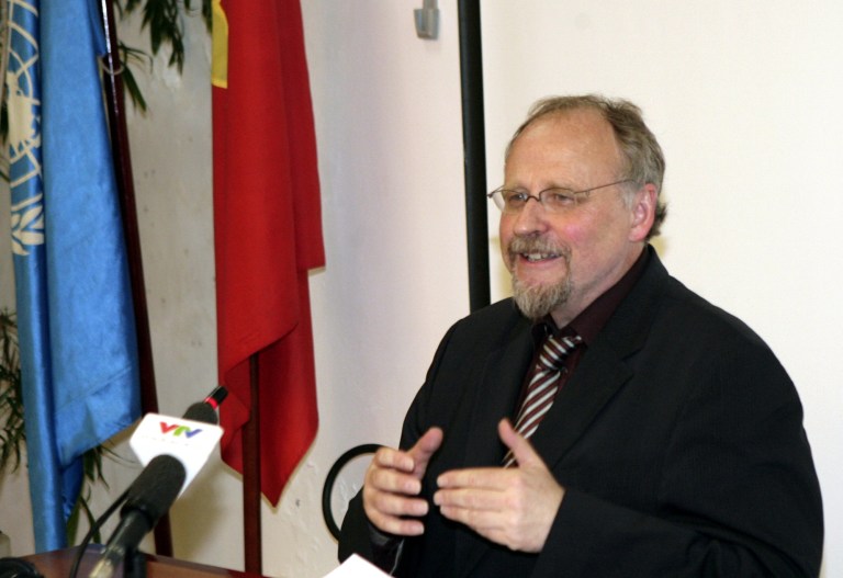 U.N. Special Rapporteur on religious freedom Heiner Bielefeldt gestures during a press briefing in Hanoi, Vietnam on Thursday, July 31, 2014. Bielefeldt said that security agents closely monitored his visit and people he wanted to meet were harassed and intimidated. He said that serious violations of religious freedom existed, while noting some improvements. (AP Photo/Tran Van Minh)