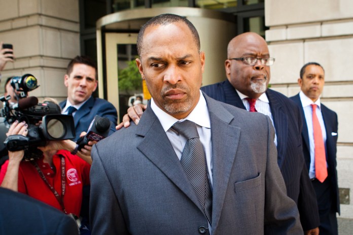 Former D.C. Councilman Harry Thomas Jr. leaves court after pleading guilty to two federal crimes. Thursday, May 3, 2012
