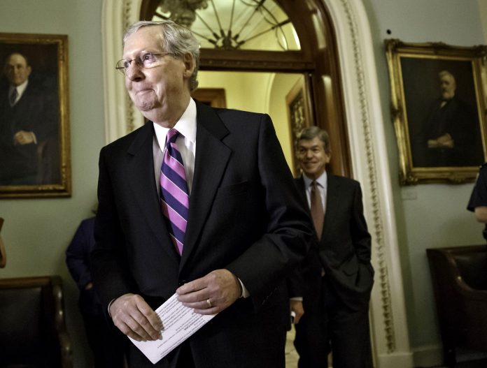 "I'll be voting for the continuing resolution, assuming it comes over as we think it is from the House," Senate Minority Leader Mitch McConnell, R-Ky., told reporters Tuesday, referring to the spending bill that will include authorization to support the Free Syrian Army. (AP Photo/J. Scott Applewhite, File)