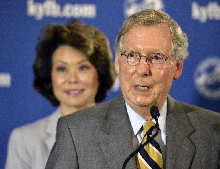 Sen. Mitch McConnell responds to a question from reporters following a candidates' forum at the Kentucky Farm Bureau Insurance headquarters Wednesday in Louisville. (AP Photo/Timothy D. Easley)