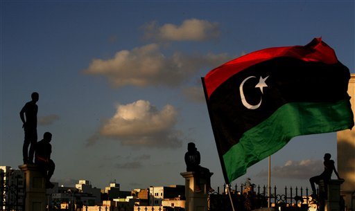 Libyans watch the protest against Ansar al-Shariah Brigades and other Islamic militias, in Benghazi, Libya Sept. 21. (AP Photo)