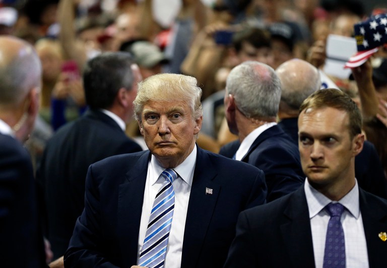 Trump's big victory (and politically speaking, it is a victory) includes further inducements and subtle threats over the federal contracts of Carrier's parent company. (AP Photo/Brennan Linsley)