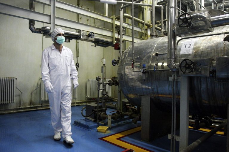In this Feb. 2007 file photo, an Iranian technician walks through the Uranium Conversion Facility just outside the city of Isfahan, 255 miles south of the capital Tehran, Iran. (AP Photo)Â 