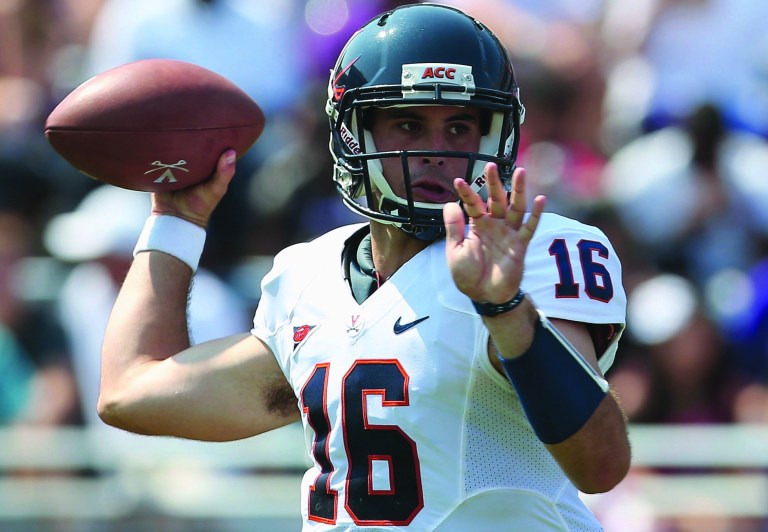 Ronald Martinez/Getty Images
Virginia's Michael Rocco split time at quarterback with Phillip Sims much of the year.