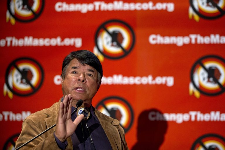 Ray Halbritter, National Representative of the Oneida Indian Nation gestures as he speaks during the Oneida Indian Nation's Change the Mascot symposium, Monday, Oct. 7, 2013, in Washington, calling for the Washington Redskins NFL football team to change its name. During an interview, President Barack Obama suggested that the owner of the Washington Redskins football team consider changing its name because, the president said, the current name offends 