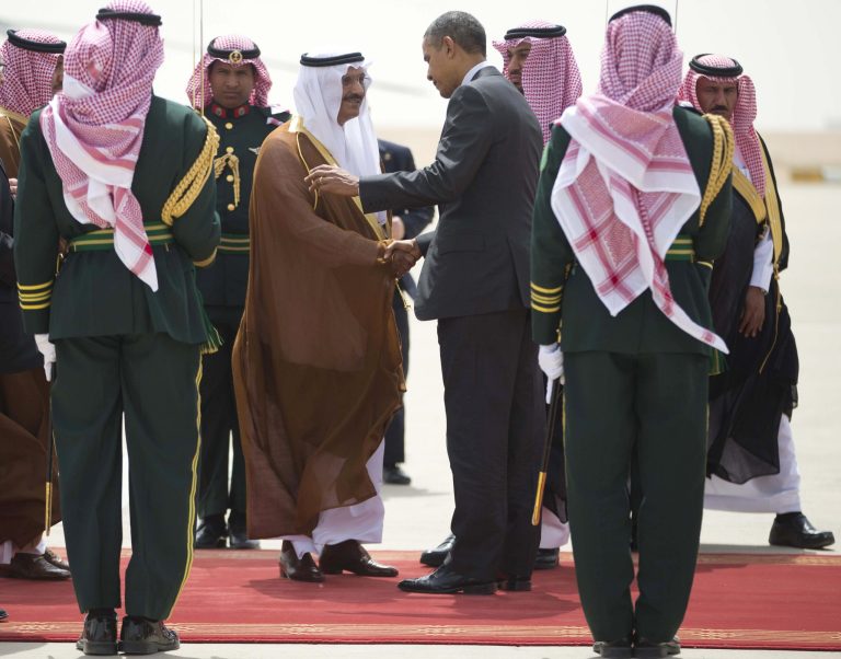 FILE - In this Saturday, March 29, 2014 file photo, U.S. President Barack Obama shakes hands with Governor of Riyadh Prince Khalid bin Bandar, during Obama's departure ceremony at King Khalid International airport in Riyadh, Saudi Arabia. The Saudi Press Agency said late Monday, June, 30, 2014 that King Abdullah named Prince Khalid bin Bandar to the post of chief of general intelligence. Khalid was relieved of his post as deputy defense minister on Saturday, barely six weeks after he was appointed. (AP Photo/Pablo Martinez Monsivais, File)
