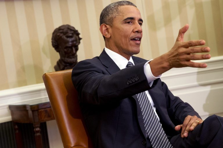 President Barack Obama speaks to the media during a meeting with Secretary of Defense Ash Carter in the Oval Office of the White House, Tuesday, Feb. 17, 2015, in Washington. The president spoke about issues including immigration and the Islamic State. (AP Photo/Jacquelyn Martin)