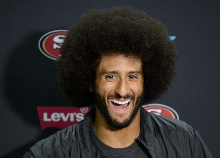 Former San Francisco 49ers quarterback Colin Kaepernick is the pick to lead Black Lives Matter, according to a new poll. (AP Photo/Denis Poroy)